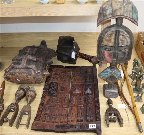 A group of African tribal carvings and bronze figures